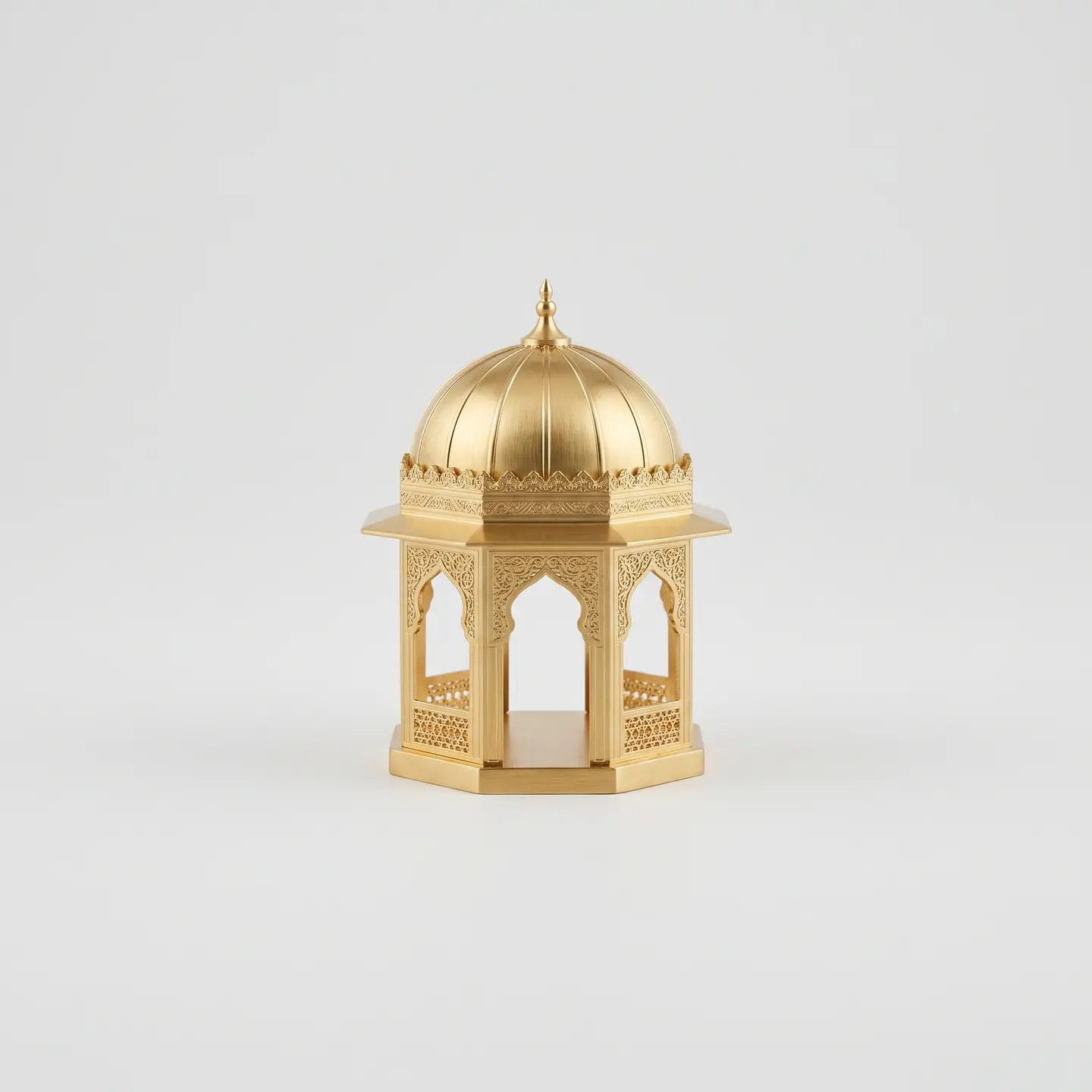 A gilded octagonal brass pavilion with a ribbed dome and pierced Islamic fretwork